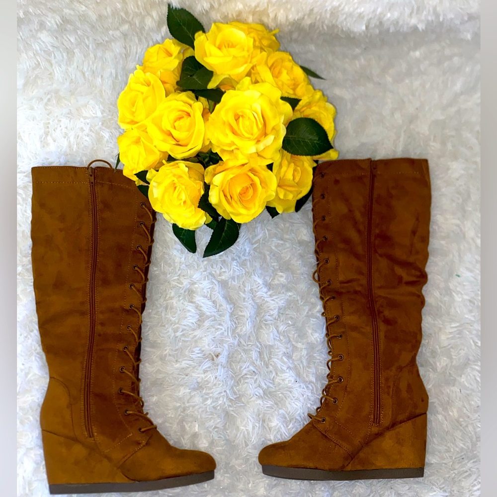 Brown heeled boots.